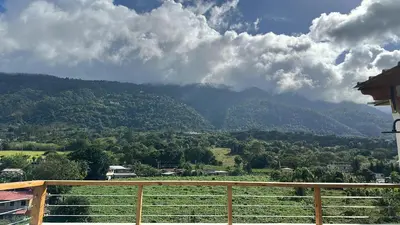 a view of a mountain from a balcony at Azotea Quinta Galarza