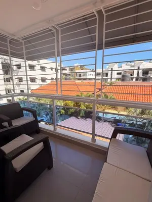 a living room with a view of a building at Apartamento de lujos Avenida España
