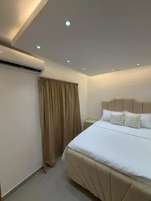 a bedroom with a large bed and a window at Piscina Playa 3 Min Aeropuerto Cerca in Boca Chica