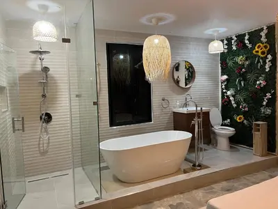 a bathroom with a tub and a shower and a toilet at Monte y Cielo 1 apartment in Las Galeras