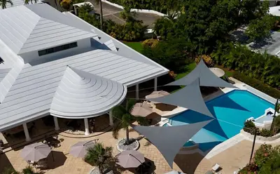 an overhead view of a building with a swimming pool at Oris Chic & Tropical Suite, Breakfast in Las Terrenas