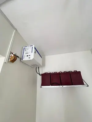 a room with a shelf with a machine on the ceiling at Apartamento en bani in Baní