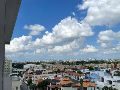a view of a city under a cloudy sky at Civil tower oceance in Santo Domingo