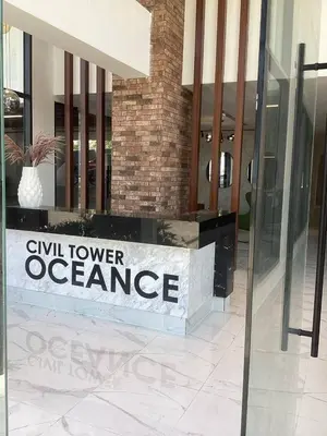 a sign that reads civil tower office in a building at Comfortable oceanfront apartment on Av España in La Francia