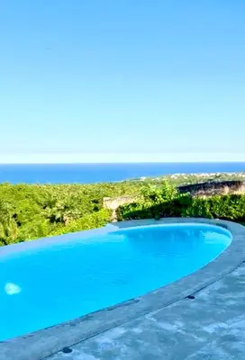 an aerial view of a blue lake at Casa Amalfi Luxury Oceanview Villa with Pool in Cabrera