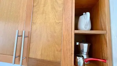 a wooden cupboard with a computer mouse in it at 2BR villa & 1BR Guest House, Pool and Beach at Playa Encuentro, Cabarete in Cabarete