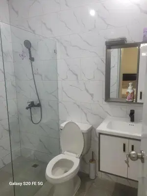 a bathroom with a shower and a toilet and a sink at Bienvenido a casa in San Pedro de Macorís