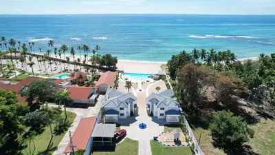 an aerial view of a house on the beach at Villas Caribe in Juan Dolio