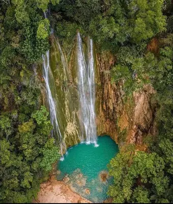 an aerial view of a waterfall in a forest at Las Terranas Dream Condo in Las Terrenas