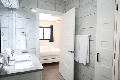 a bathroom with a sink and a mirror at Bonita Extravaganza 4 Bedroom, 4 Bed, 3 Bedroom in Sosúa