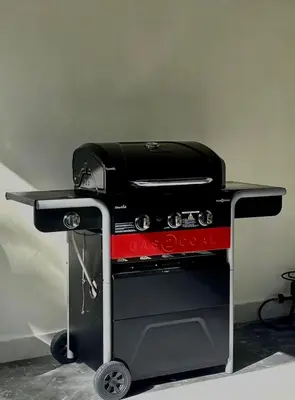 a grill sitting on top of a cart at Villa Anaylia