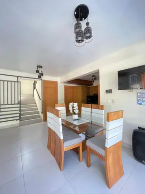 a dining room with a table and chairs at Villa Anaylia
