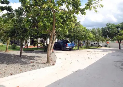 a truck parked on the side of a road with trees at Villa Anaylia