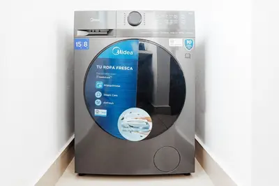 a close up of a machine with its door open at Exclusive Top-Floor Penthouse with Jacuzzi - BlueCasas in Santiago de los Caballeros
