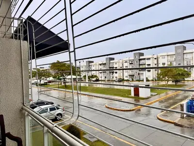 a view of a city street from a balcony at Ocean View Fast Wifi Close to Everything Coffee 2BR in La Cana
