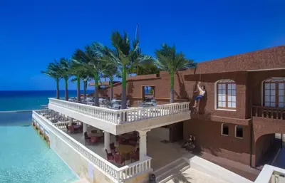 an aerial view of a building on the beach at Ocean reset in Sosúa