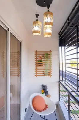 a room with a white table and two lights at Beautiful apartment on the 2nd floor in Boca Residence
