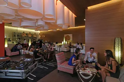 a group of people sitting in a restaurant at InterContinental Real Santo Domingo by IHG in Santo Domingo