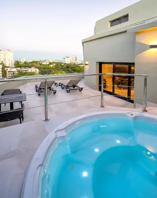 a hot tub on the roof of a building at W&P Santo Domingo in Santo Domingo
