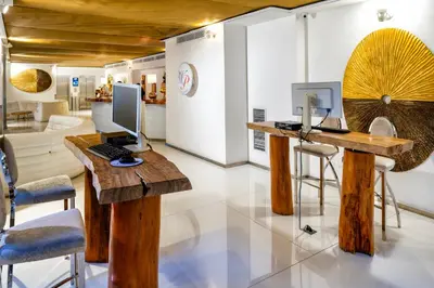 a room with a desk with a computer on it at W&P Santo Domingo in Santo Domingo