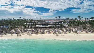 an aerial view of a beach with a crowd of people at Bahia Principe Grand Aquamarine - Adults Only All Inclusive in Punta Cana