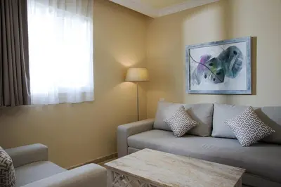 a living room with a couch and a table at VIK Hotel Cayena Beach All Inclusive in Punta Cana