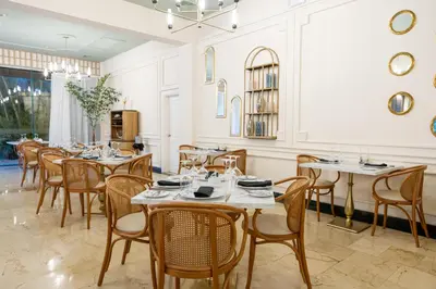 a dining room filled with tables and chairs at TRS Turquesa Hotel - Adults Only - All Inclusive in Punta Cana