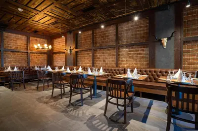 a dining room with a long table and chairs at Punta Cana Princess Adults Only - All Inclusive in Punta Cana