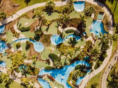 an overhead view of a pool at a resort at Hard Rock Hotel & Casino Punta Cana - All Inclusive in Punta Cana