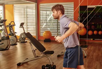 a man in a gym with a bow at El Embajador, a Royal Hideaway Hotel in Santo Domingo