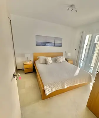 a bedroom with a large bed and a window at Estrella Dominicus Advantage in Bayahibe