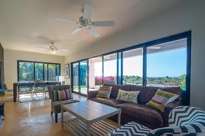 a living room with a couch and a table at House 24 in Casa Linda in Sosúa