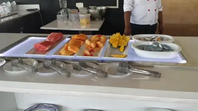 a buffet with different types of food on a table at Appartamento Cadaques Bayahibe in Bayahibe