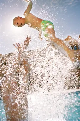 a man playing in the water in the ocean at Barceló Santo Domingo in Santo Domingo