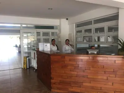 two women sitting at a counter in a restaurant at Marbella Juan Dolio in Juan Dolio