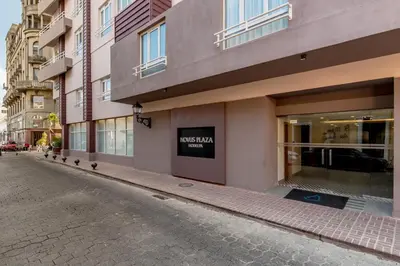 an empty street in front of a building at Novus Plaza Hodelpa in Santo Domingo