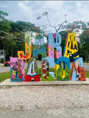a sign that says abc in a park at Springhouse jarabacoa in Jarabacoa