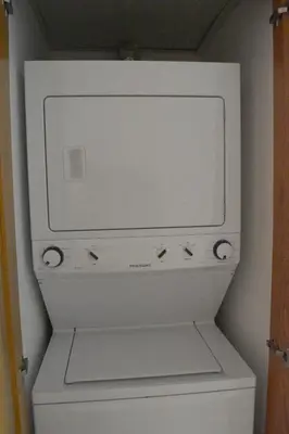 a white washer and dryer in a bathroom at Las Olas by Destinos1a in Juan Dolio