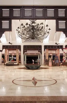 a large lobby with a chandelier in the middle at VH - Gran Ventana Beach Resort in San Felipe de Puerto Plata