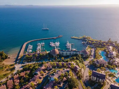 an aerial view of the marina at the disneyland resort at The Bannister Hotel & Yacht Club by Mint in Santa Bárbara de Samaná
