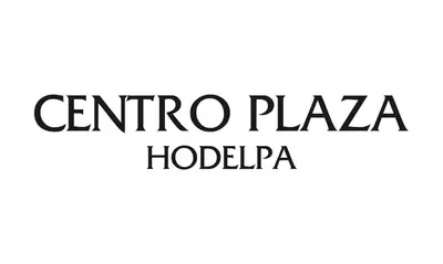 a close up of the text of the cinco plaza hotelapa at Hodelpa Centro Plaza in Santiago de los Caballeros