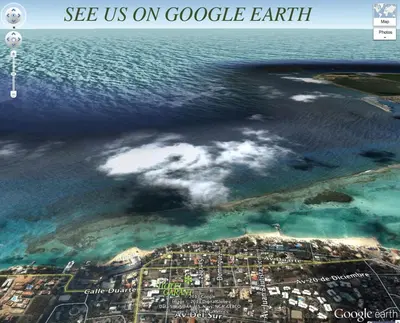 an aerial view of the beach and the ocean at Hotel Garant & Suites in Boca Chica