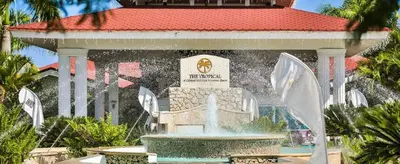 a fountain in front of a building with a sign at Junior Suite in Puerto Plata at Lifestyle Holidays Vacation Club in San Felipe de Puerto Plata