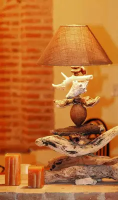 a lamp sitting on top of a table at El Beaterio Casa Museo in Santo Domingo