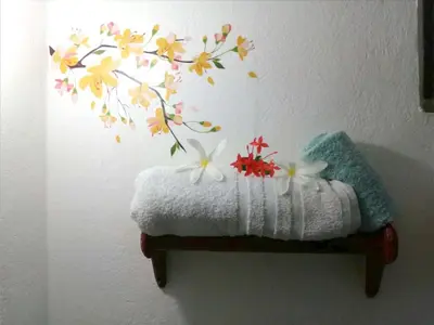 a wall with a flower mural on a wall at House Jardin Del Caribe in Las Terrenas