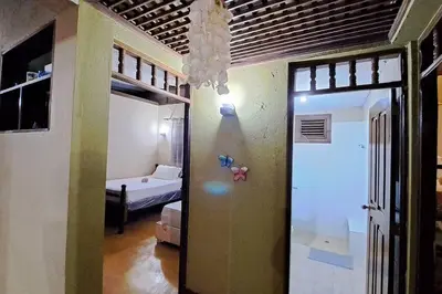 a room with a bedroom with a bunk bed at Casa Villa Anacahuita in Jarabacoa