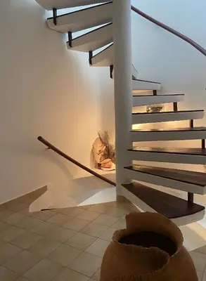 a staircase with a hammock in a room at Cabarete Beachfront Condos at Nanny Estate C-5 in Cabarete