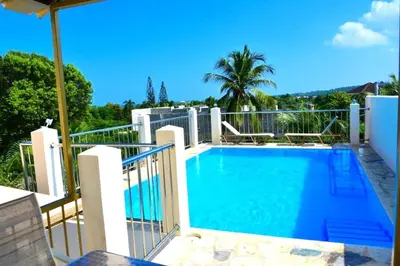 a large swimming pool on top of a building at Villa Vista azul Sosua in Sosúa