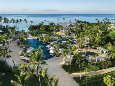 an aerial view of the resort with the ocean in the background at Dreams La Romana All-Inclusive Resort & Spa in Bayahibe