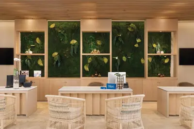a restaurant with a large painting of butterflies at Secrets La Romana All-Inclusive Adult Only Resort & Spa in Bayahibe